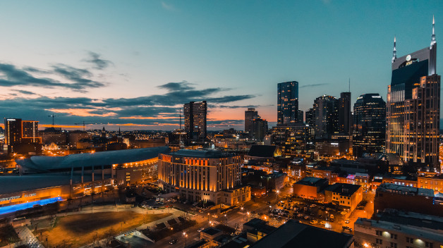 Nashville city sky line at dusk lit by soft city lights